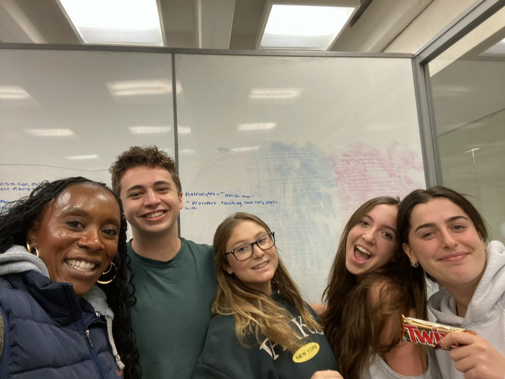 Dean Dixon with a group of Syracuse University students in the DOS selfie challenge.
