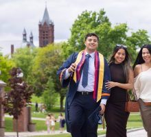 syracuse university student with family at graduation
