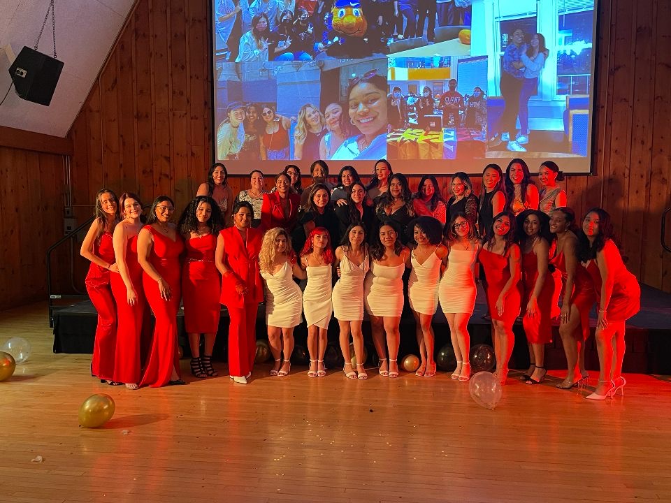 Members of Lambda Pi Chi Sorority, Inc. at their chapter banquet