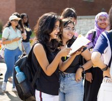 International students stand together during Welcome Week events
