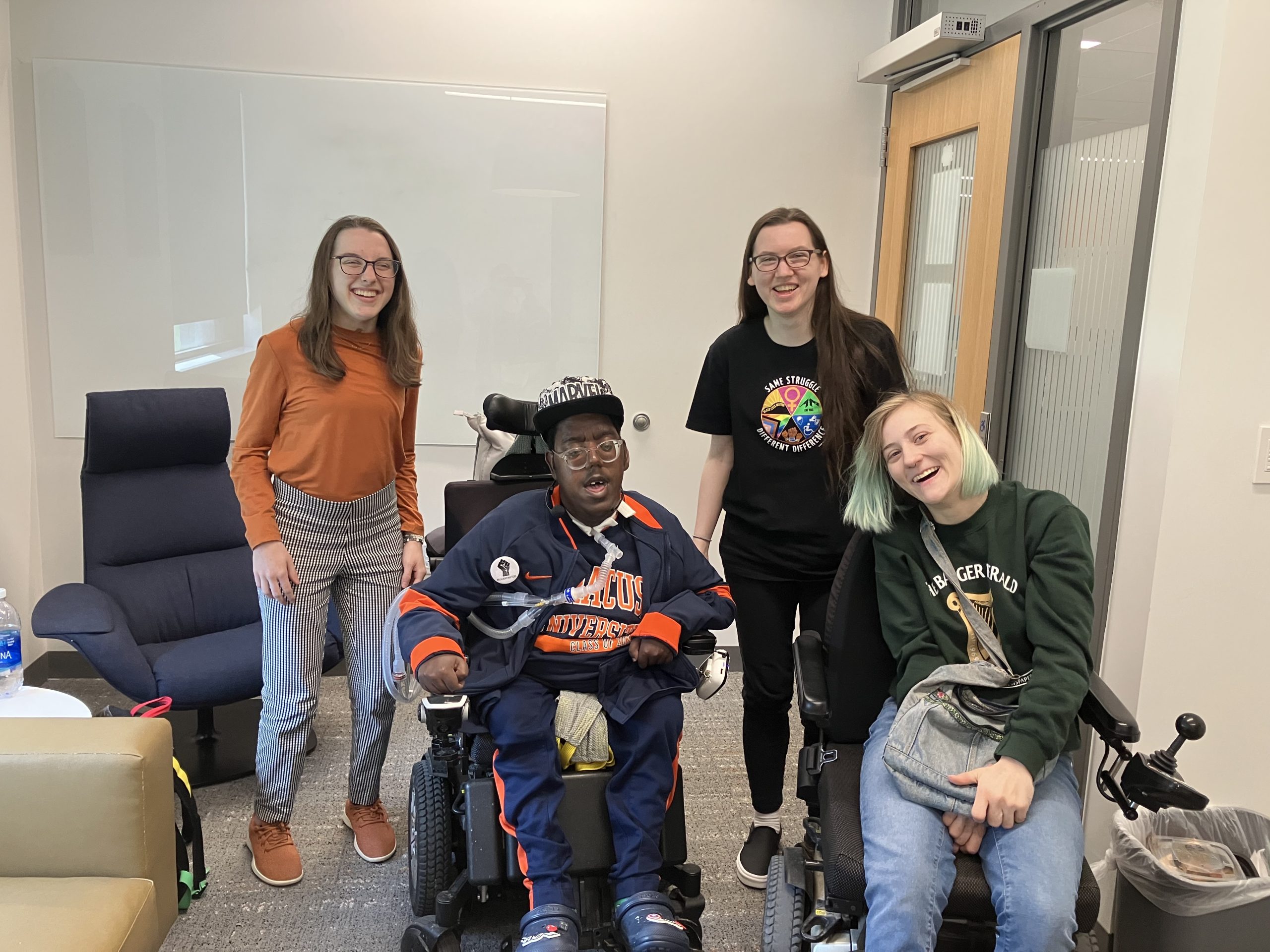 Four students posing for a picture.