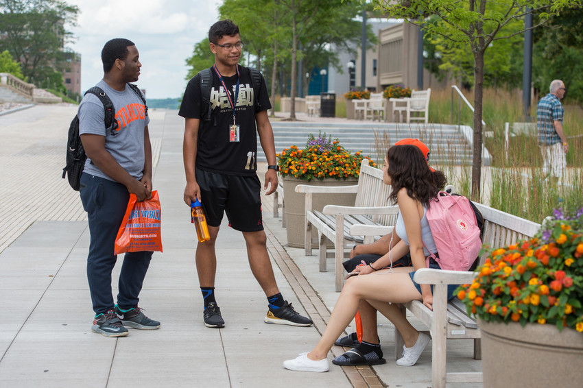 SummerStart students talking on campus.