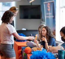 New students move in to the a residence hall