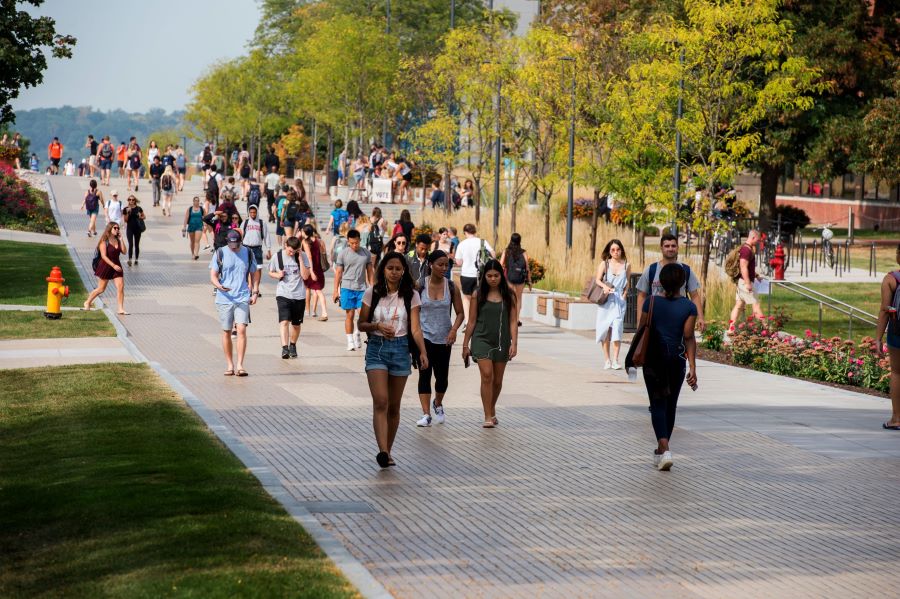 Syracuse University students on campus and supported by Student Outreach and Retention. 