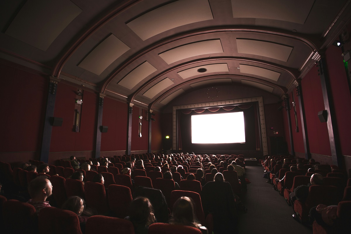 People seated in a movie theater