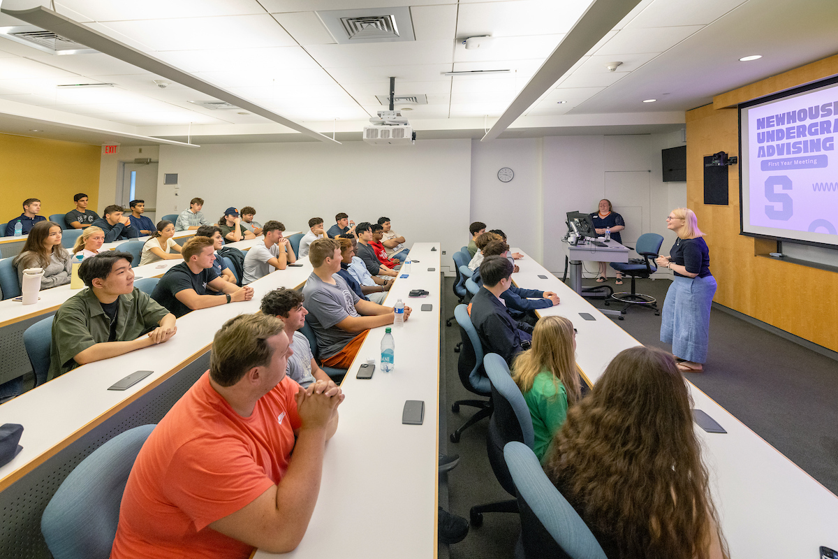 Students seated in a Newhouse classroom