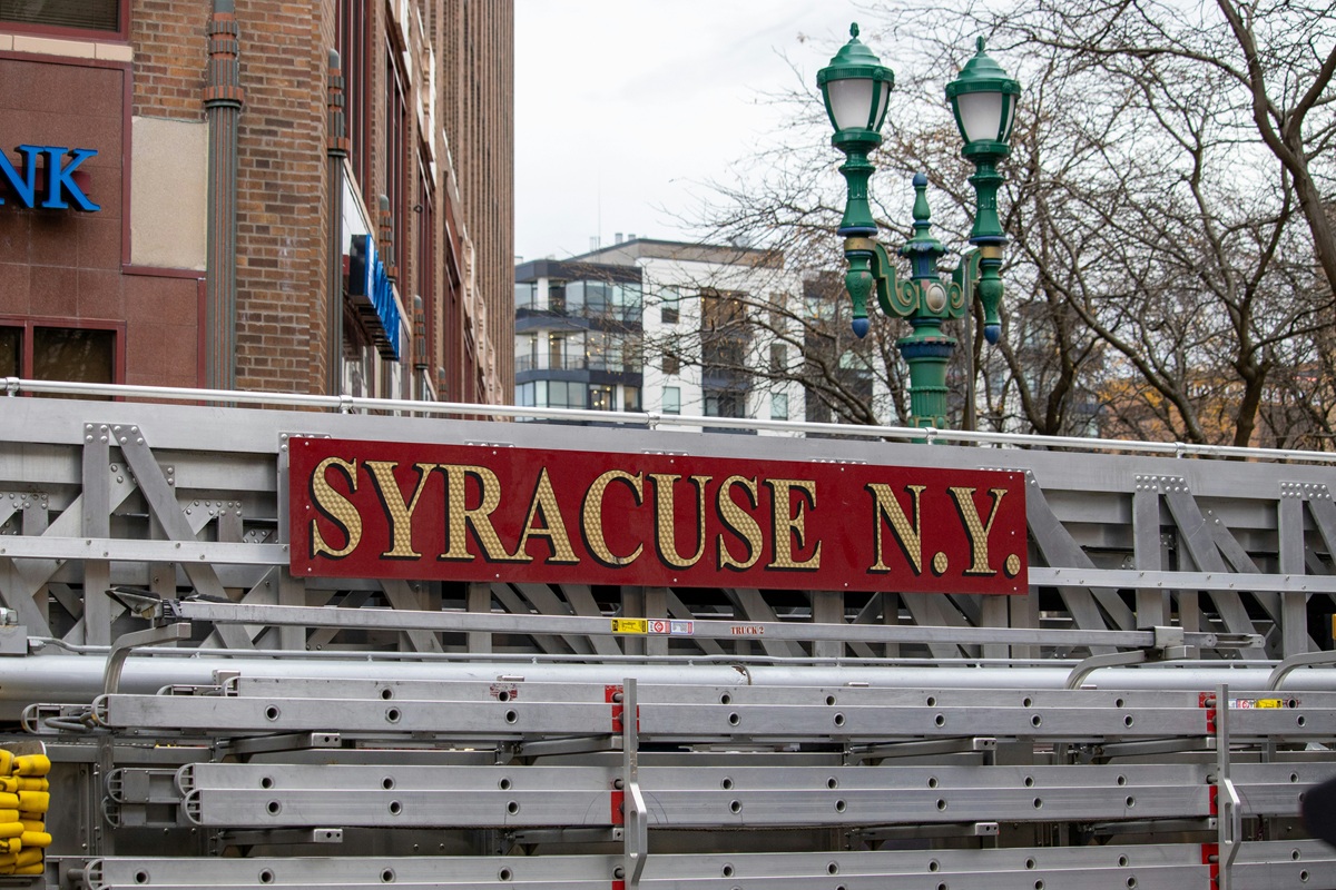 fire truck ladder with the text Syracuse N.Y. on it.