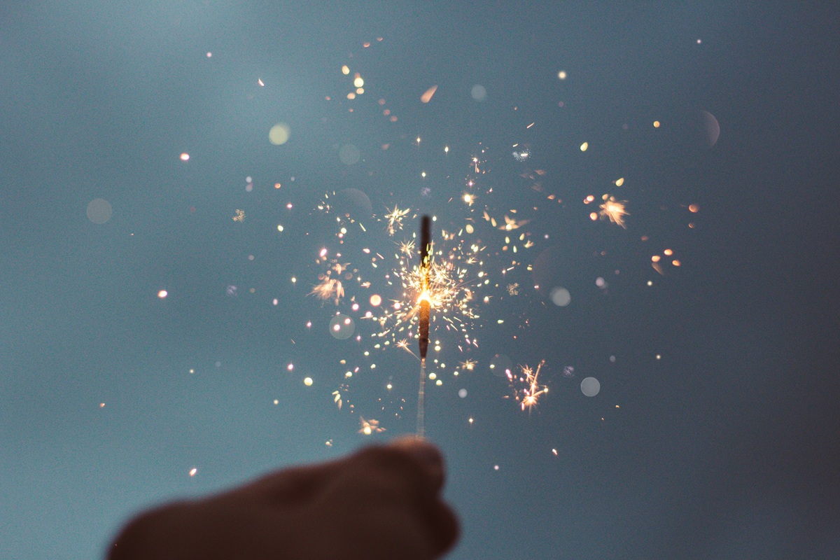 sparkler in a persons hand
