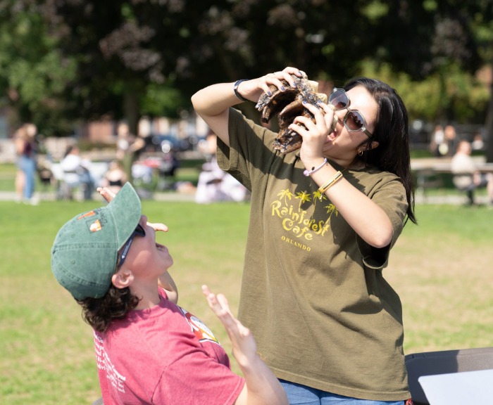 Two students goofing around.