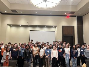 The 2024 Inspire Leadership Retreat participants all stand together for a group photo